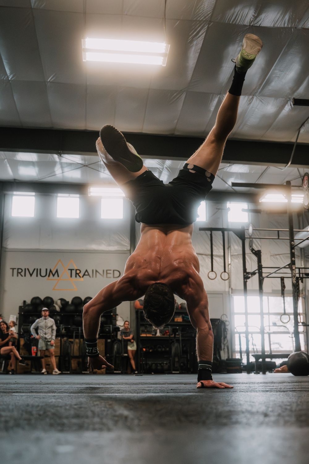 Athlete holding a handstand during competition